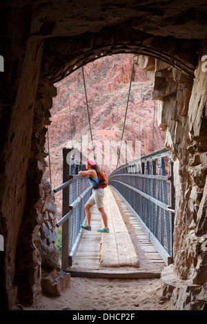 Tunnel and Black Bridge over the Colorado River are part of the South Kaibab Trail, Grand Canyon National Park, Arizona. Stock Photo