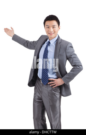 Portrait of young businessman executives extending hands to shake,close-up Stock Photo