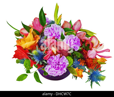 Floral bouquet of orchids, gladiolus and carnations arrangement centerpiece in blue glass vase isolated on white background. Stock Photo