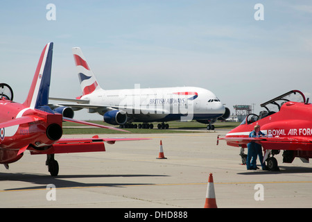 Airbus A380 with British Airways livery on runway with Red Arrows at Manston Airport, Kent, England, UK Stock Photo