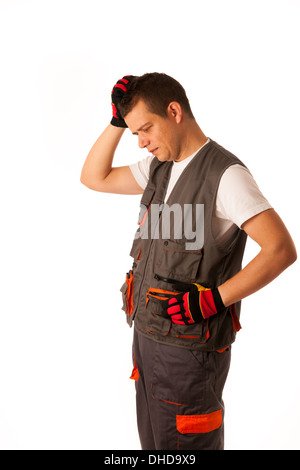 Worried construction worker isolated over white background Stock Photo