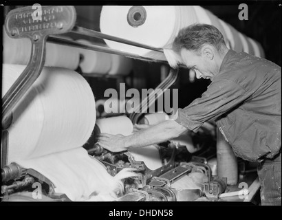 High Point, North Carolina - Textiles. Pickett Yarn Mill. Combers operative - very skilled - most complicated machine... 518507 Stock Photo