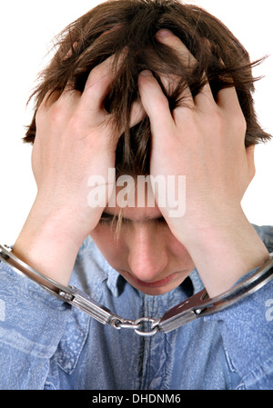 Troubled Man in Handcuffs Stock Photo