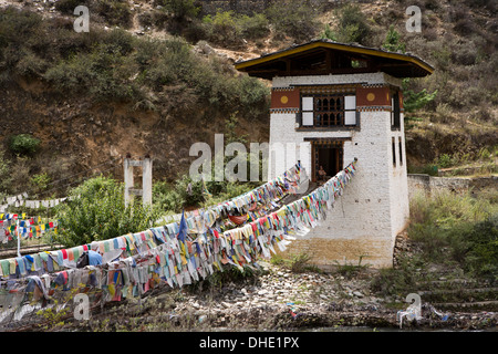 Bhutan, Paro Valley, Tachog Lhakang Dzong bridge, originally built by Thangtong Gyalpo, covered in prayer flags Stock Photo