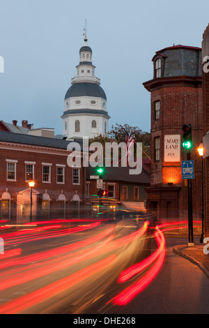 Traffic on Church Circle in Annapolis, Maryland creates streaks of light in front of the Maryland State House and Maryland Inn. Stock Photo