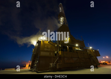 Doyon Oil Rig 14 On The Road Moving To Another Drill Site In The Prudhoe Bay Oil Field, North Slope, Arctic Alaska, Winter Stock Photo