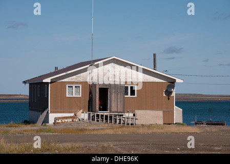 Canada, Nunavut, western shore of Hudson Bay, Kivalliq Region, Arviat. Typical northern community neighborhood home. Stock Photo