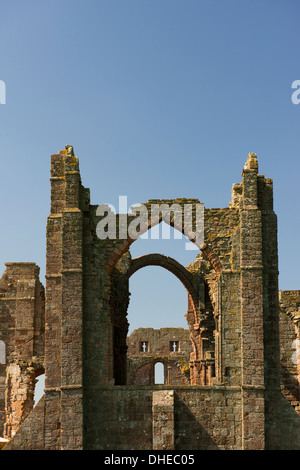 The ruins of Lindisfarne Priory on Holy Island, Northumberland, UK Stock Photo