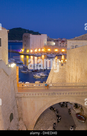 Harbour and Old City Walls at dusk, UNESCO World Heritage Site, Dubrovnik, Dalmatia, Croatia, Europe Stock Photo