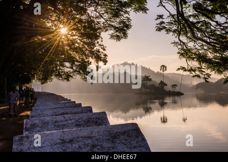 Sunrise at Kandy Lake and the island which houses the Royal Summer House, Kandy, UNESCO, Central Province, Sri Lanka Stock Photo