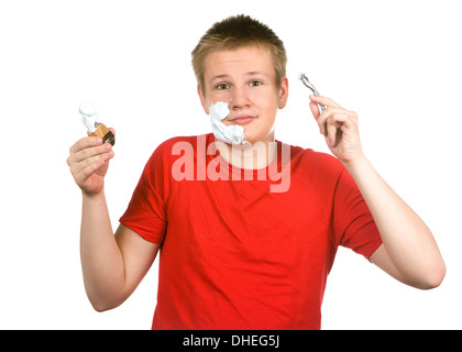 The boy, the teenager the first time tries Stock Photo