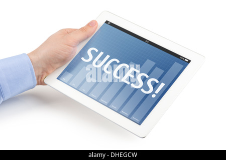 Man's left hand holding a tablet computer with business interface on the screen, isolated on a white background. Stock Photo