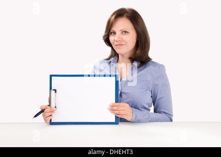 Business woman is holding a blank clipboard, business concept Stock Photo