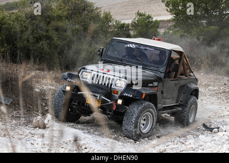 Cross country rally. A 4x4 event photographed in Israel A jeep negotiates the terrain Stock Photo