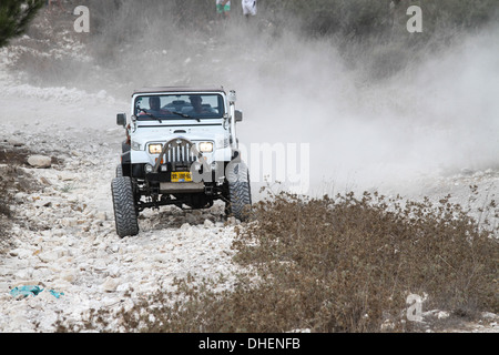 Cross country rally. A 4x4 event photographed in Israel A jeep negotiates the terrain Stock Photo