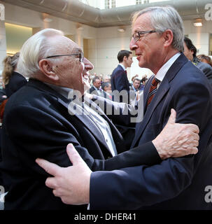 Berlin, Germany. 08th Nov, 2013. Luxembourg's sitting Prime Minister Jean-Claude Juncker (R) and former SPD-politician Egon Bahr greeteach other at the beginnig of an award presentation in Berlin, Germany, 08 November 2013. Juncker receives the price of the German Society. Photo: WOLFGANG KUMM/dpa/Alamy Live News Stock Photo