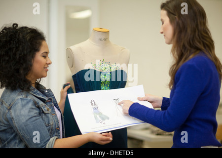 Fashion design students in discussion Stock Photo