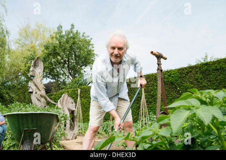 Senior man gardening Stock Photo