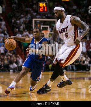 Miami, Florida, USA. 7th Nov, 2013. Los Angeles Clippers point guard Chris Paul (3) drives past Miami Heat small forward LeBron James (6) at AmericanAirlines Arena in Miami, Florida on November 7, 2013. Credit:  Allen Eyestone/The Palm Beach Post/ZUMAPRESS.com/Alamy Live News Stock Photo