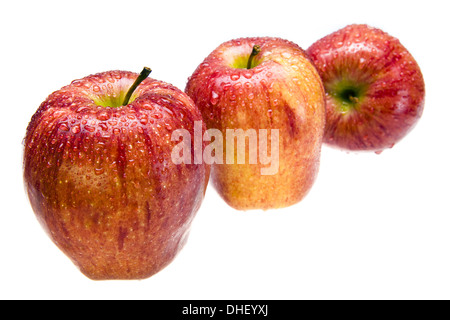 Three juicy apples  n drops of water Stock Photo