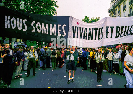 Paris, France, Large Crowd of People, AIDS Activists from Act Up-Paris, Marching in Street, at Annual Gay Pride March (LGBT) Militants with protesters banner reading 'We are Still living and Beautiful' people marching, aids demonstration Stock Photo