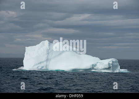 Canada, Quebec, Lower Savage Islands located between Frobisher Bay & the Hudson Strait, large iceberg. Stock Photo