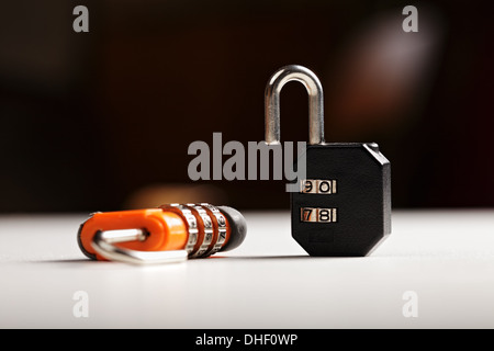 Two locks on white surface Stock Photo