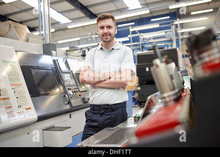 Portrait of male worker in engineering factory Stock Photo