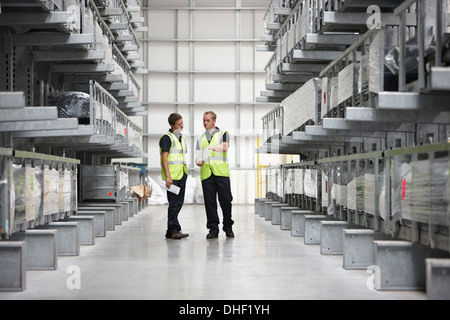 Warehouse workers in engineering warehouse Stock Photo
