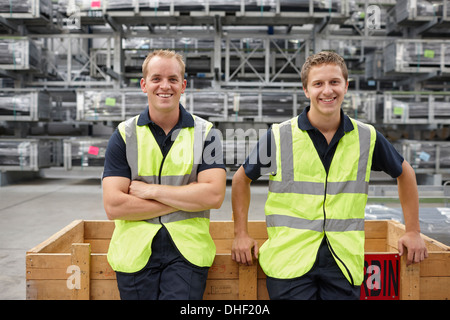 Portrait of warehouse workers in engineering warehouse Stock Photo