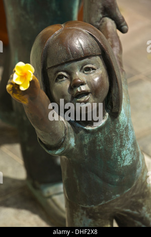 Statue of a small girl outside the Peranakan Museum, Armenian Street, Singapore. Stock Photo
