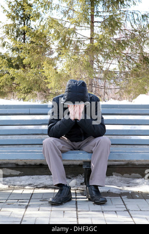 Sad Man on the Bench Stock Photo