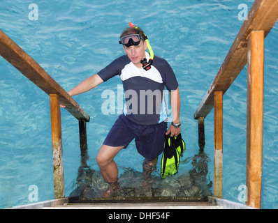 Young sports man with flippers, mask Stock Photo