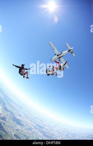 Skydivers free falling above Leutkirch, Bavaria, Germany Stock Photo