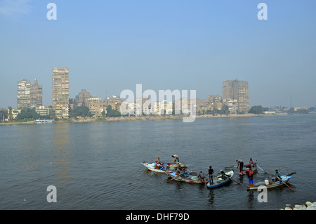 Local fishermen off Corniche El Nil on the right bank of the Nile River in Cairo, Egypt. Stock Photo