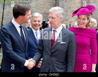 The Hague, The Netherlands. 8th Nov, 2013. King Philippe(Filip) (C) and Queen Mathilde of Belgium (R) visit Prime Minister Mark Rutte of The Netherlands at Palace Noordeinde in The Hague, The Netherlands, 8 November 2013. Photo: Patrick van Katwijk / NETHERLANDS AND FRANCE OUT/dpa/Alamy Live News Stock Photo
