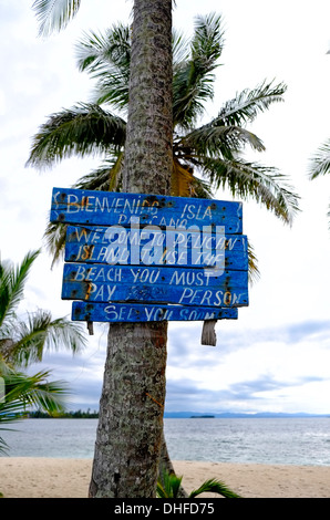 Welcome sign in a small island named Isla Pelicano or Pelican Island administered by Guna natives known as Kuna in the 'Comarca' (region) of the Guna Yala located in the archipelago of San Blas Blas islands in the Northeast of Panama facing the Caribbean Sea. Stock Photo