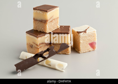 mini cakes on table with chocolate Stock Photo