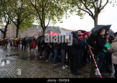 Bristol, UK. 09th Nov, 2013. Hundreds of people queue in the rain for th first worldwide auditions for the new Star Wars  movie. The queue is shut by 10.30am but still people join it Credit:  Rob Hawkins/Alamy Live News Stock Photo