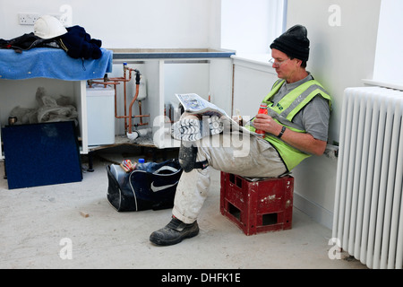 John Walker, painter, having a meal break, Stock Photo