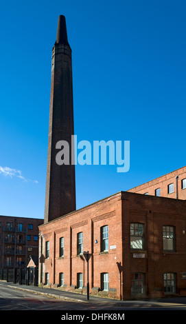 Chimney of the former Macintosh Mill (later Dunlop). The mill is now apartments. Hulme Street, Manchester, England, UK Stock Photo