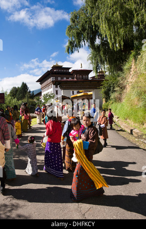 Bhutan, Thimpu Dzong, annual Tsechu, festival goers approaching Dzong festival ground Stock Photo