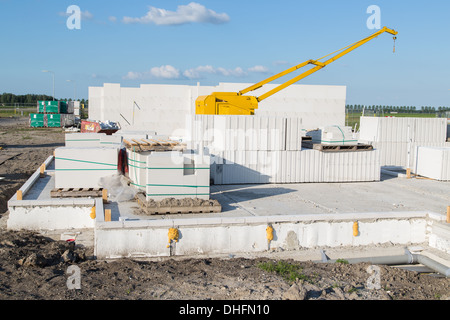 Building family houses with sand-lime bricks at a construction site Stock Photo