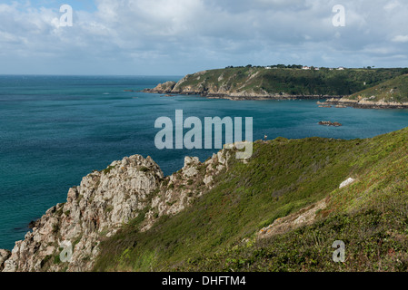 Photographer at  Moulin Huet Bay and Saints Bay, St Martin, Guernsey, Channel Islands. Stock Photo