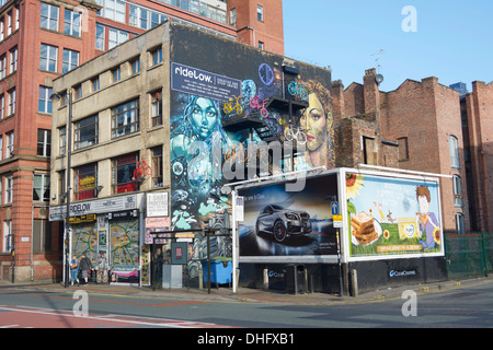 Graffiti on the side of Ridelow Bike shop in Church Street, Northern Quarter of Manchester. Stock Photo