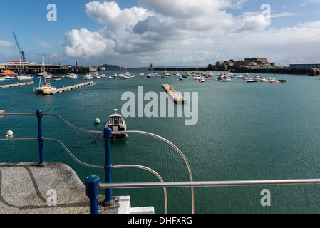 St Peter Port harbour and Castle Cornet. GUERNSEY, Channel Islands Stock Photo