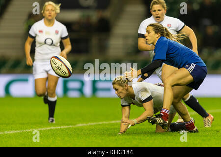 London, UK. 09th Nov, 2013. England's Natasha HUNT gets the ball away despite the attentions of opposite number France's Yanna RIVOALEN during the Women's International Rugby Union game between England and France from Twickenham Credit:  Action Plus Sports/Alamy Live News Stock Photo