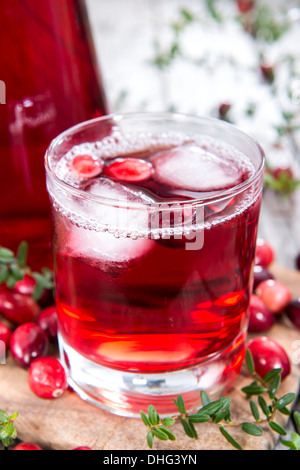 Cranberry Juice in a glass with fresh fruits Stock Photo