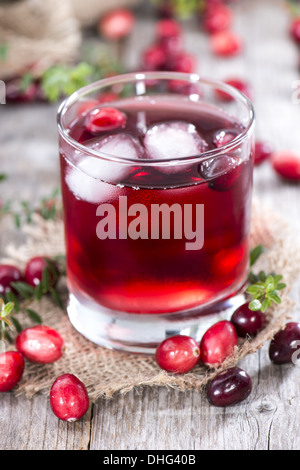 Cranberry Juice in a glass with fresh fruits Stock Photo