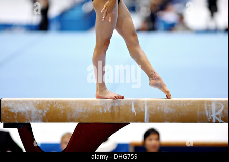 Gymnast (13-15) posing on balance beam, side view - Stock Photo -  Masterfile - Premium Royalty-Free, Code: 693-06015630